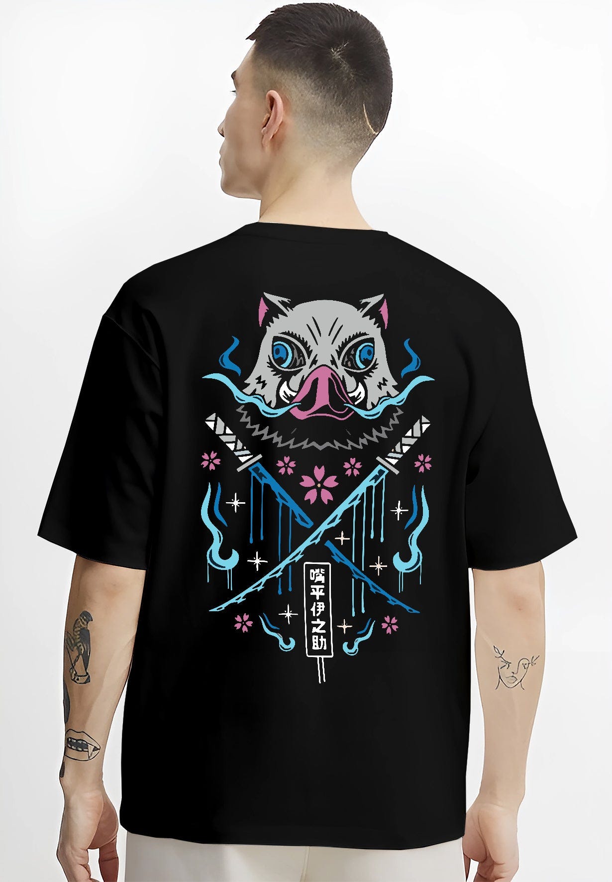Black T-shirt on male model, back view, Inosuke boar mask anime graphic with crossed Nichirin swords, blue flames, and sakura.