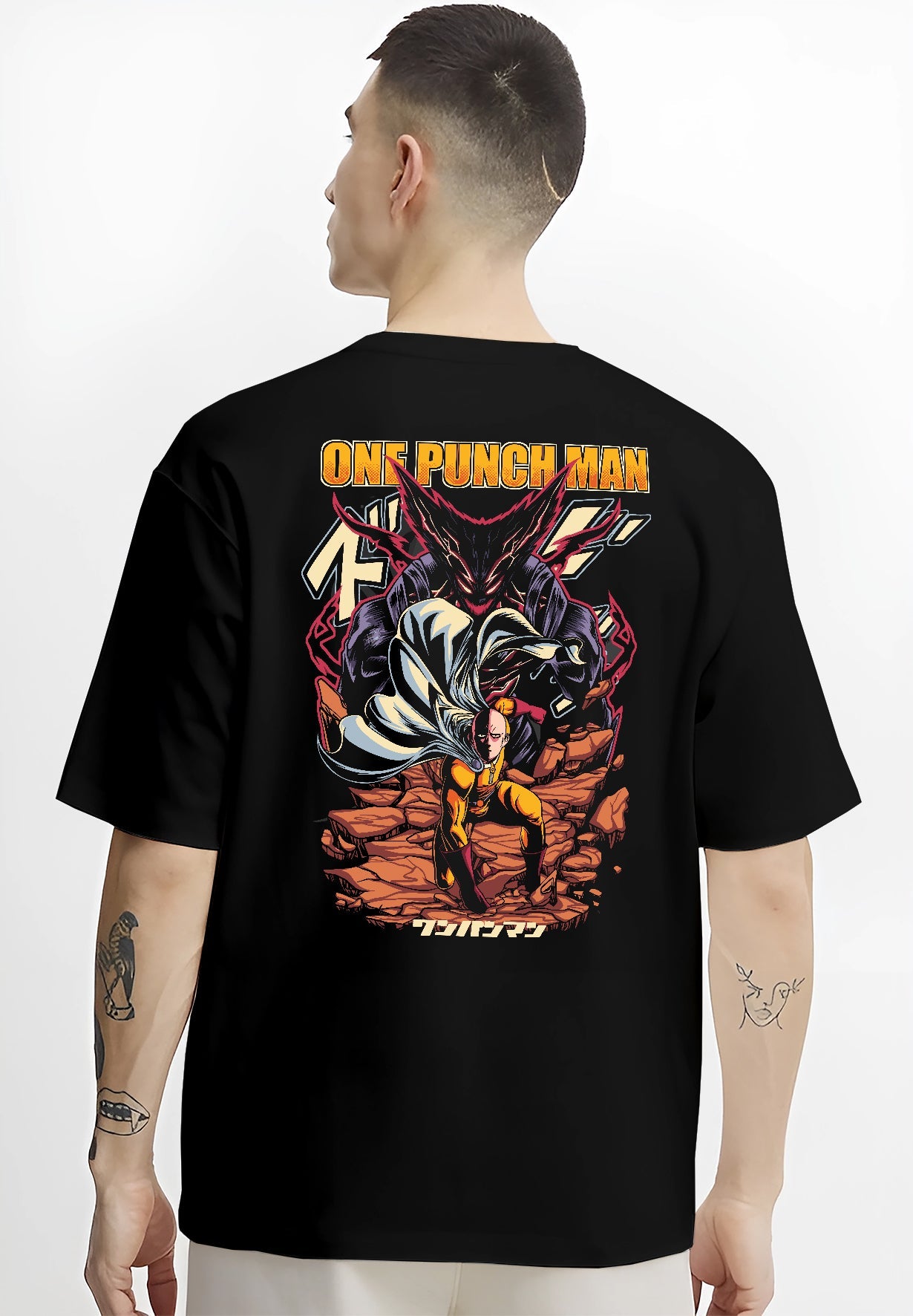 Black T-shirt worn by a male model, back view, featuring One Punch Man retro manga battle graphic with bold Saitama punch and Garou shadow in anime style.