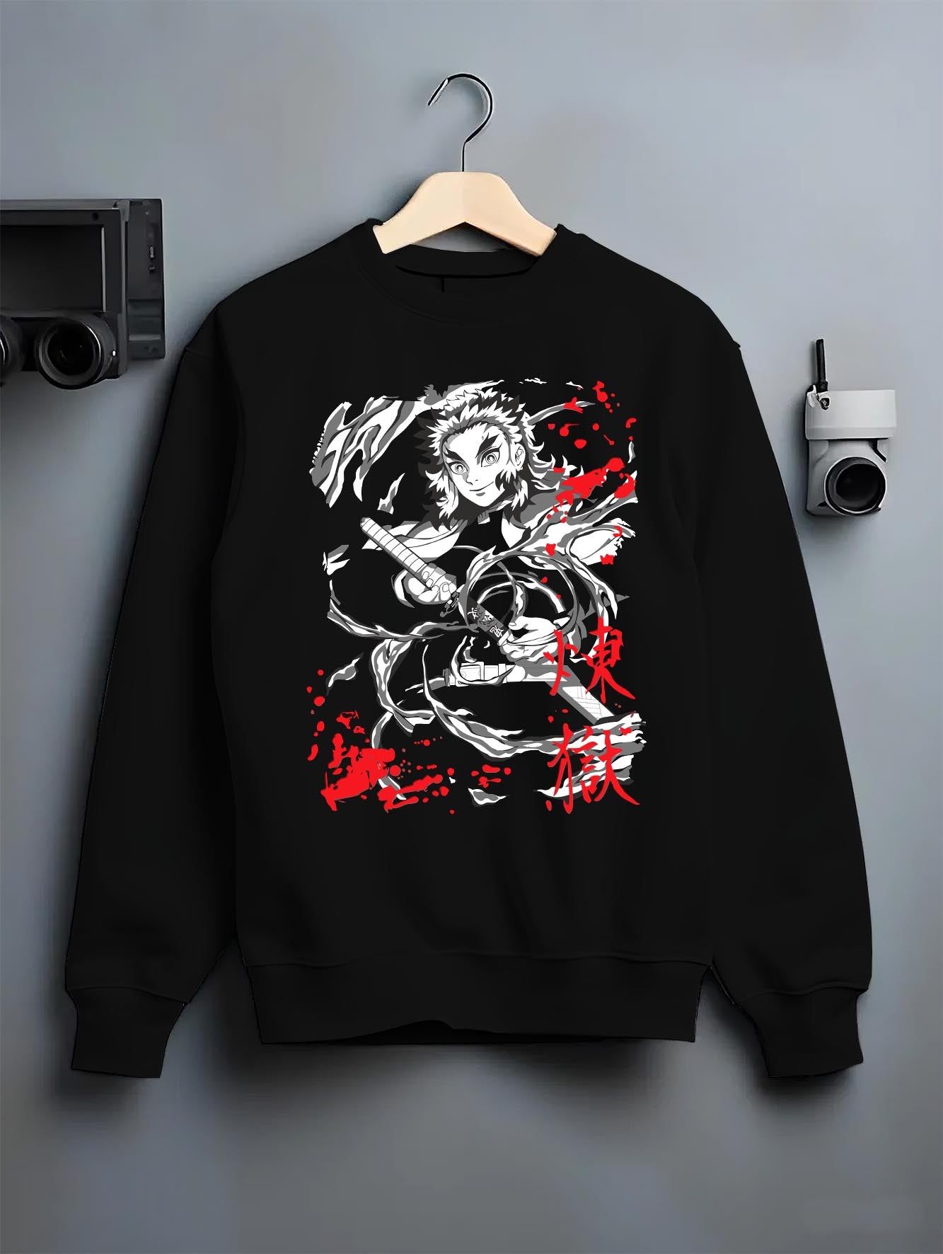 Black crewneck sweatshirt on hanger, featuring Rengoku Demon Slayer dark manga flame motif and minimalist streetwear back design.
