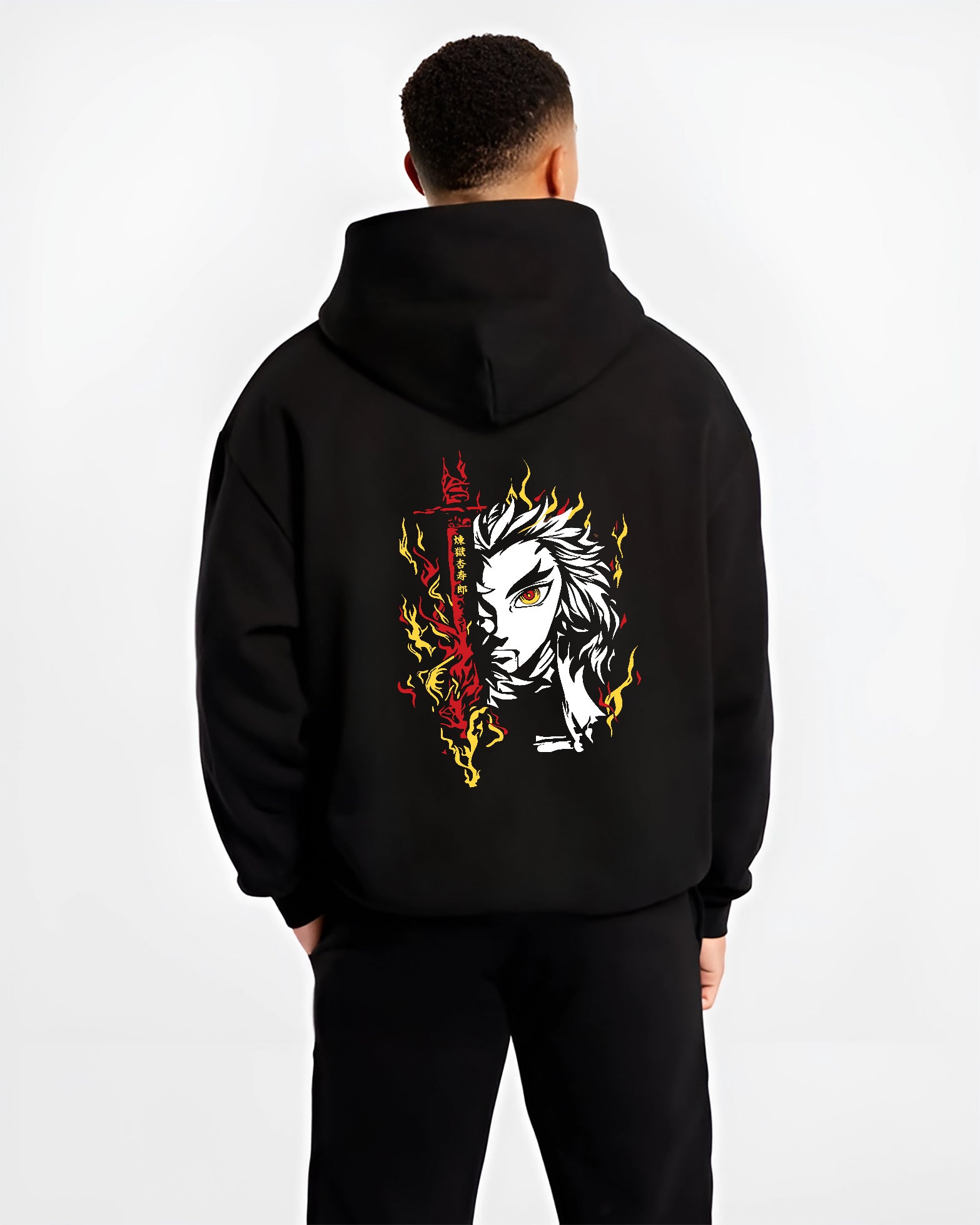 Black hoodie on male model, back view, Rengoku anime poster style portrait with vertical kanji, red blade flare, and yellow flames.