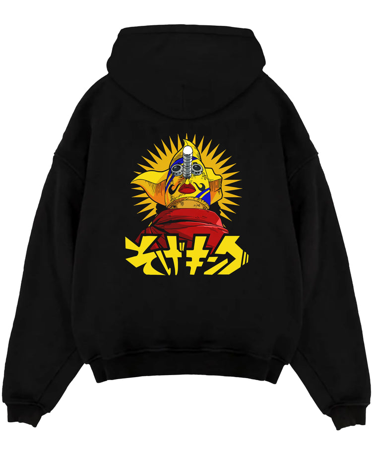 Black pullover hoodie laid flat on white, featuring retro manga graphic of a masked idol with yellow sunburst and bold Japanese typography.