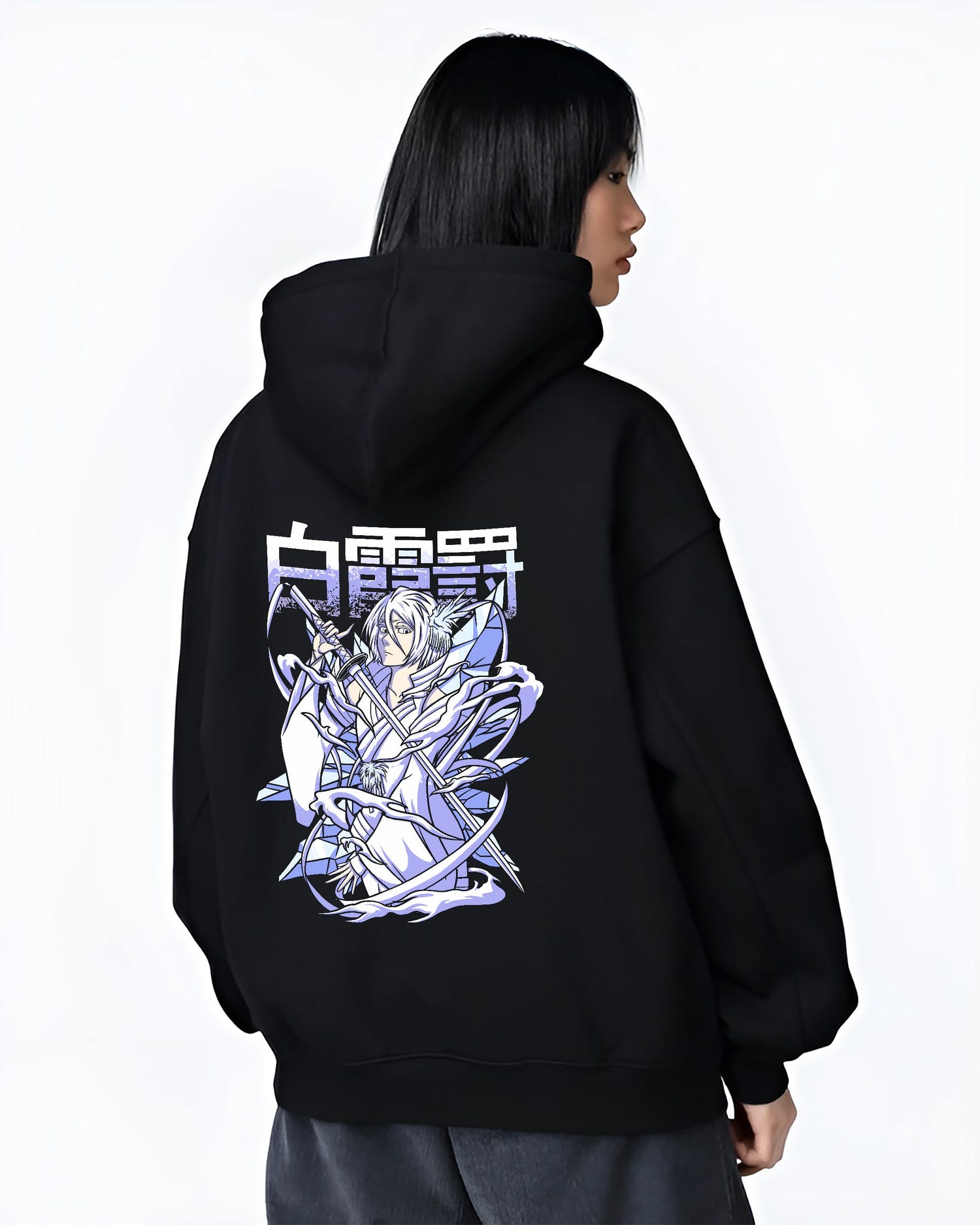 Black hoodie worn by a female model, back view, featuring Rukia Kuchiki Bleach Bankai icy anime poster inspired design with manga graphic artwork