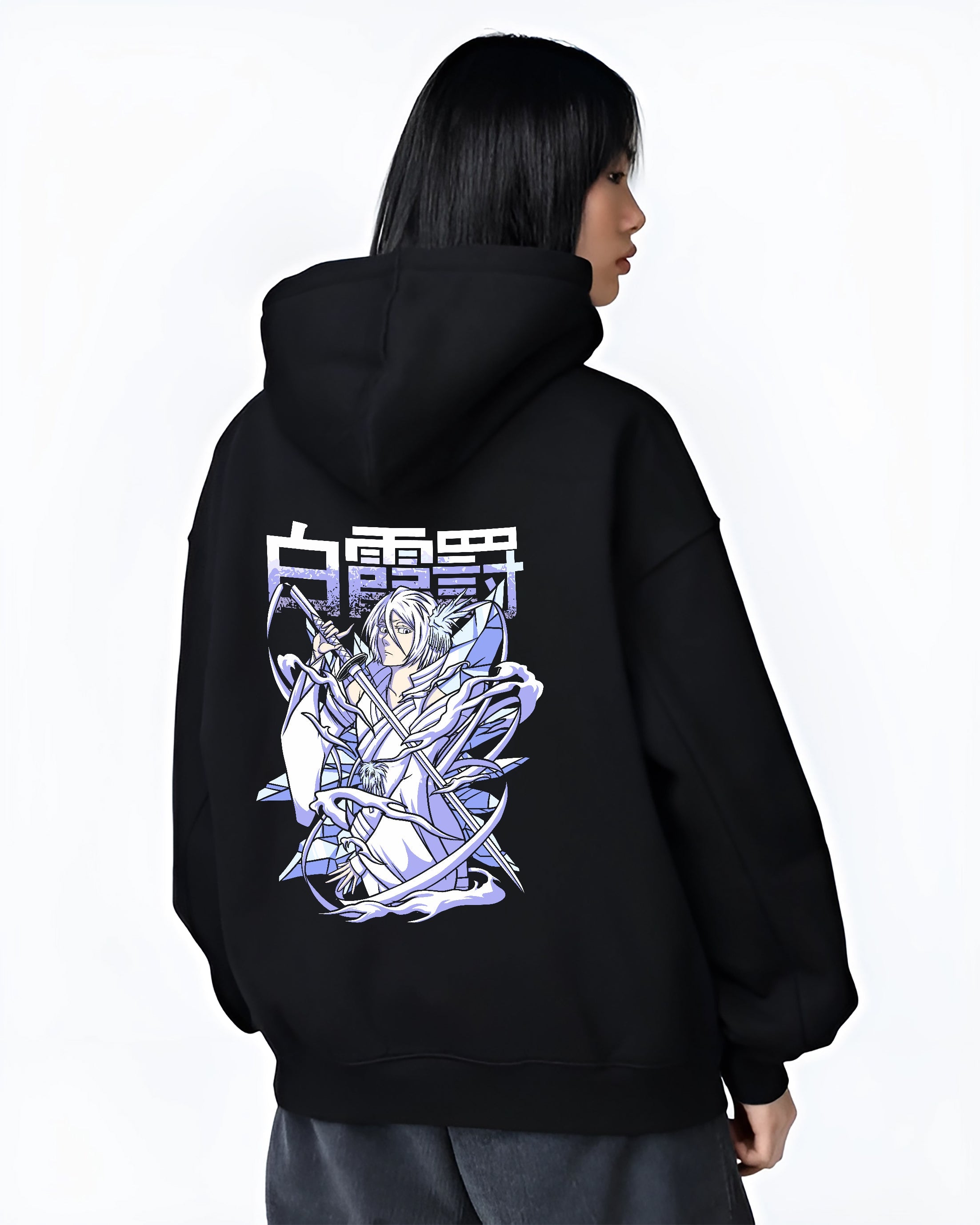 Black hoodie worn by a female model, back view, featuring Rukia Kuchiki Bleach Bankai icy anime poster inspired design with manga graphic artwork