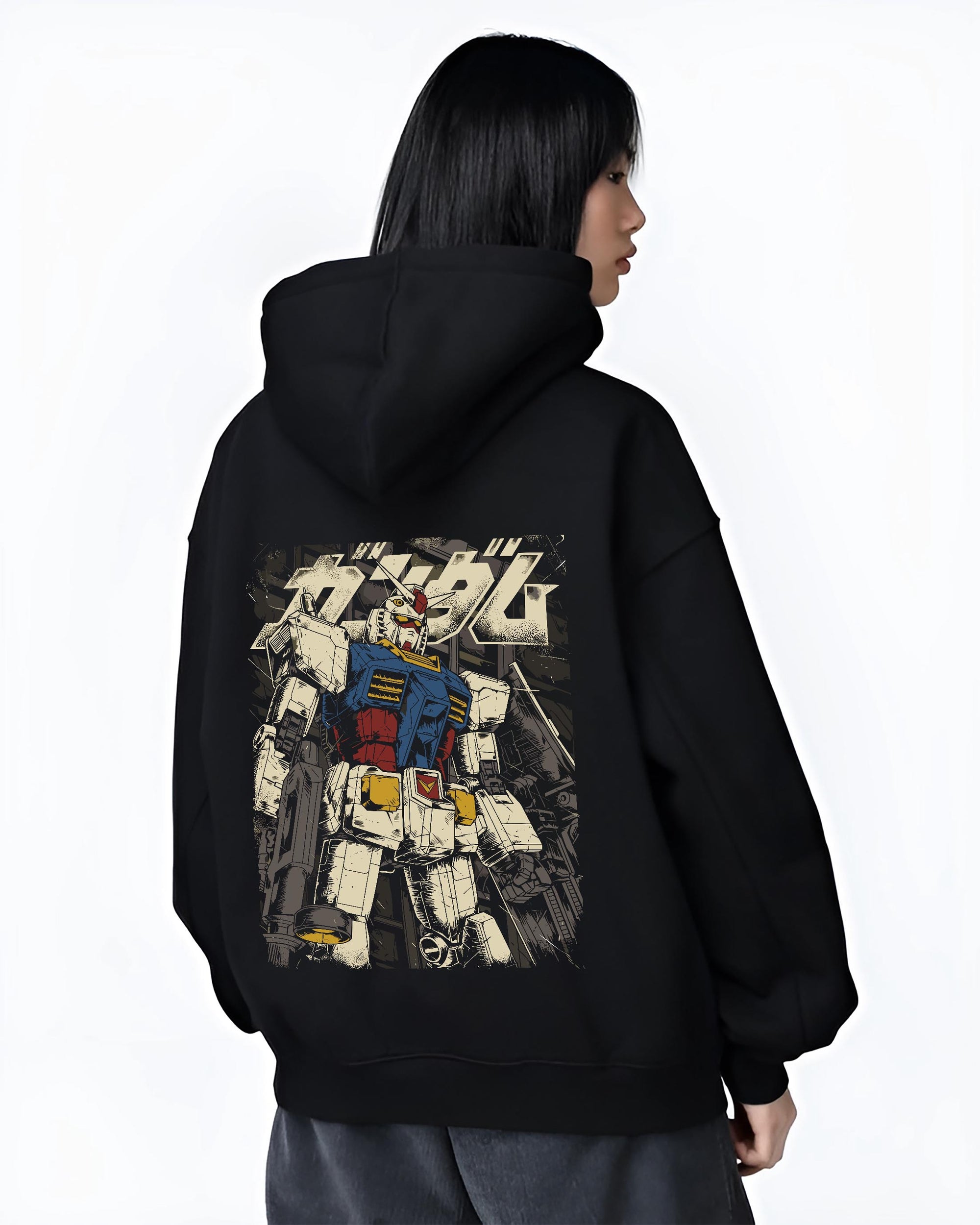 Black T-shirt worn by a male model, back view, featuring RX-78-2 Gundam retro anime mecha graphic with detailed nostalgic manga panel inspired design in vintage tones