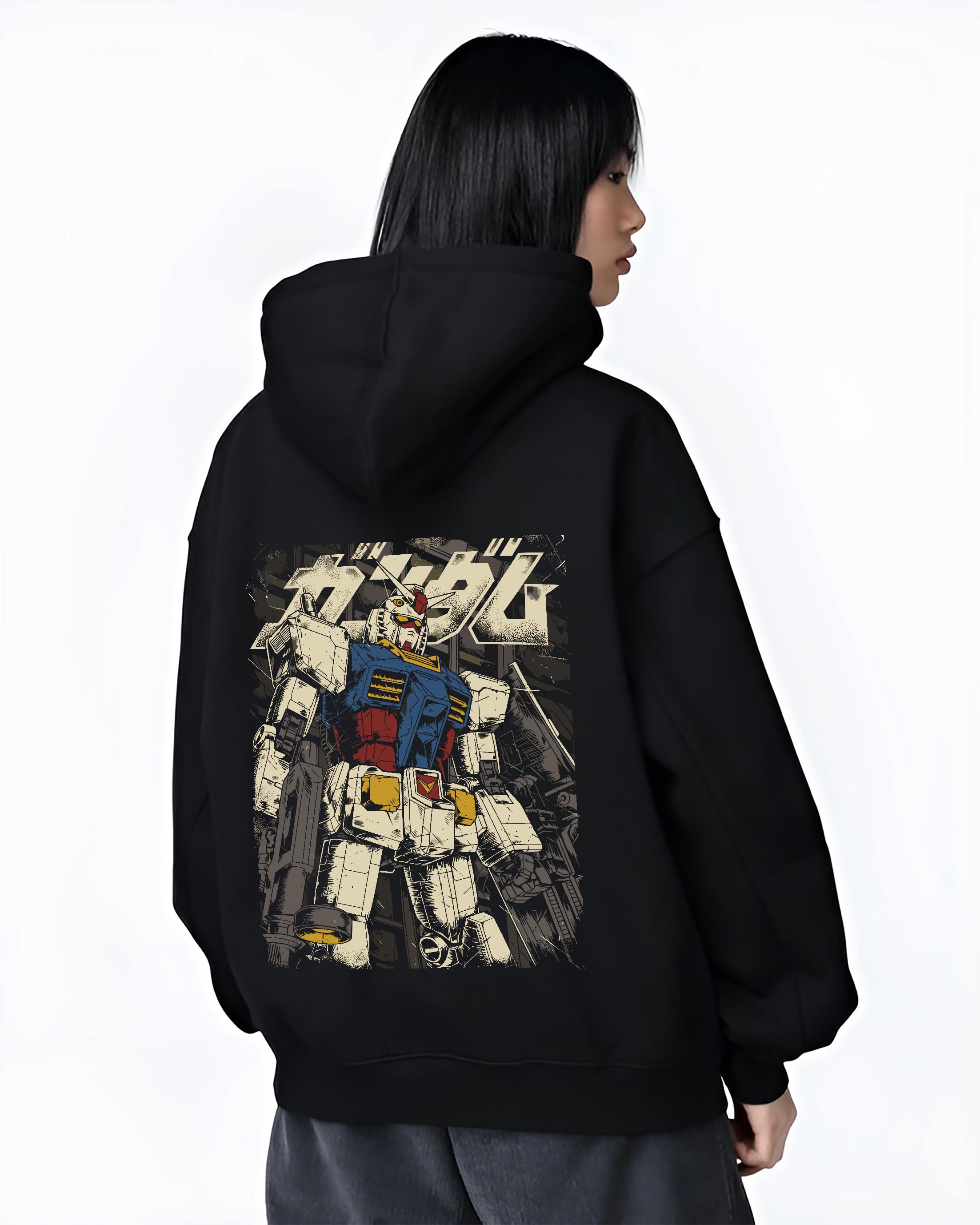 Black T-shirt worn by a male model, back view, featuring RX-78-2 Gundam retro anime mecha graphic with detailed nostalgic manga panel inspired design in vintage tones