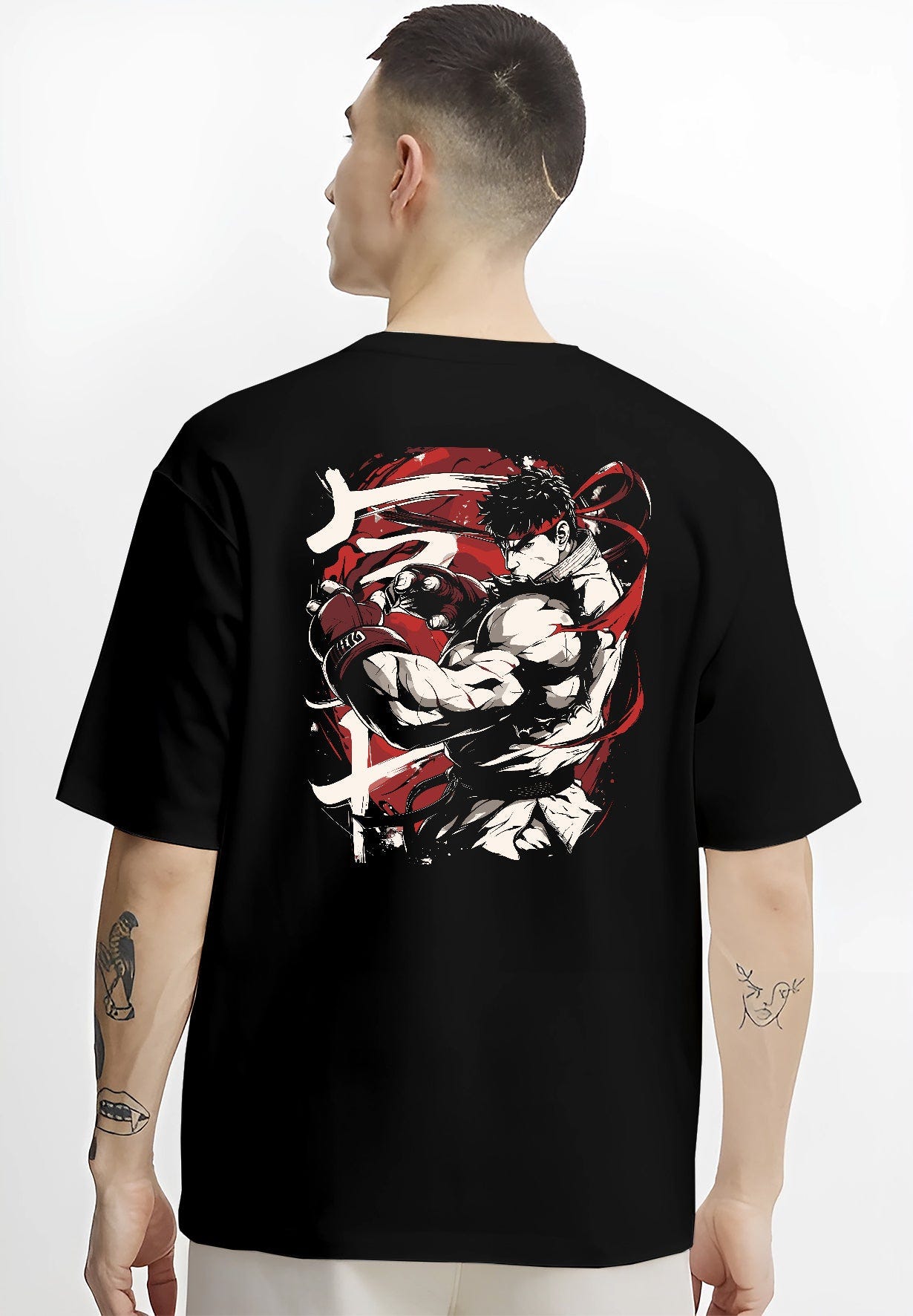 Black T-shirt worn by a male model, back view, featuring Ryu Street Fighter retro manga design with clenched gloves, red headband, and striking combat pose.