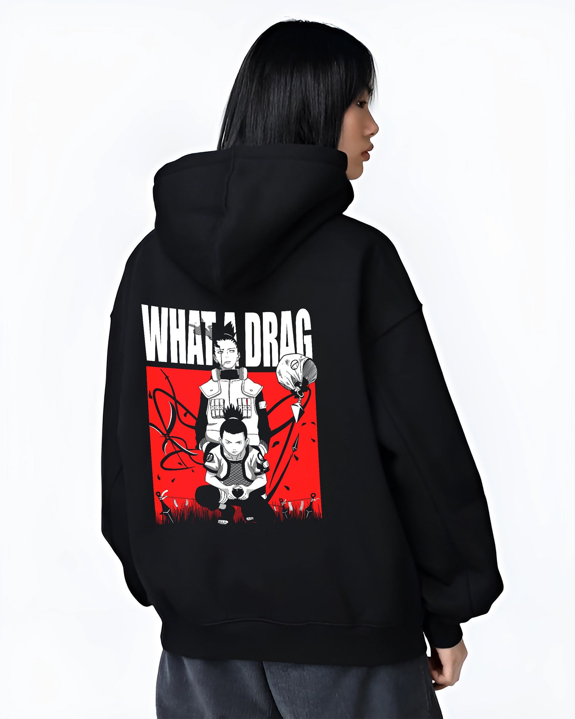 Black hoodie on female model, back view, featuring Shikamaru Naruto retro manga back design with red panel and “what a drag” line.