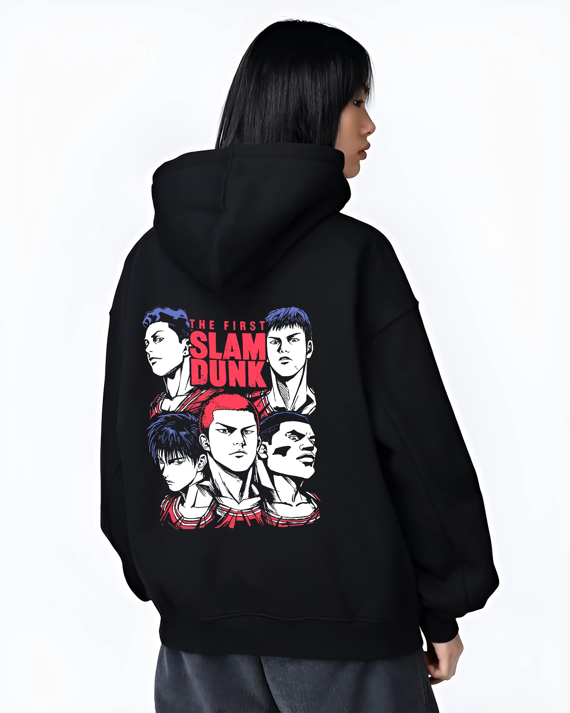 Black hoodie on female model, back view, featuring Slam Dunk cast retro manga graphic, red headline text and clean Japanese streetwear vibe.