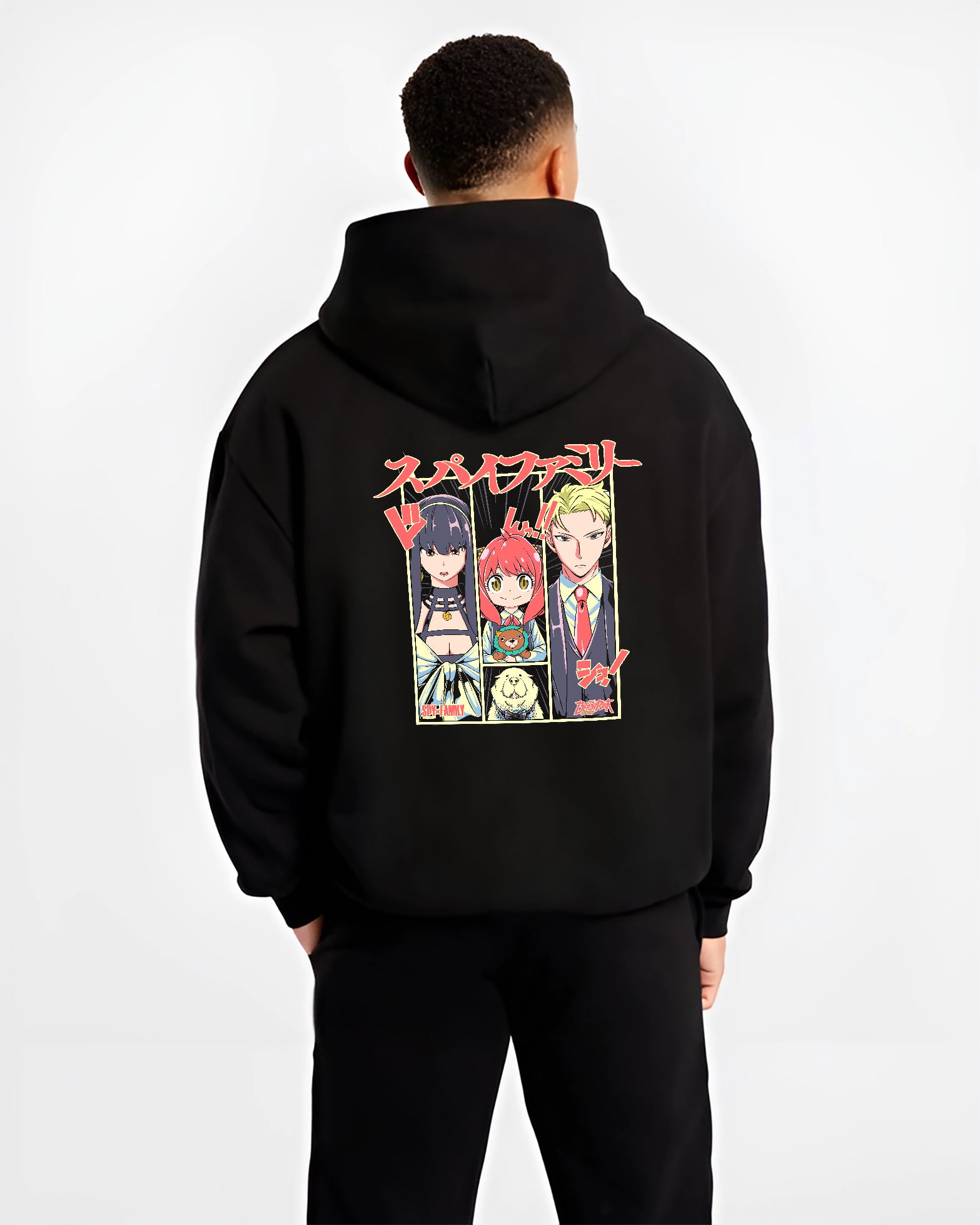 Black hoodie on male model, back view, Spy x Family trio panel artwork with Japanese text and vintage manga tones.