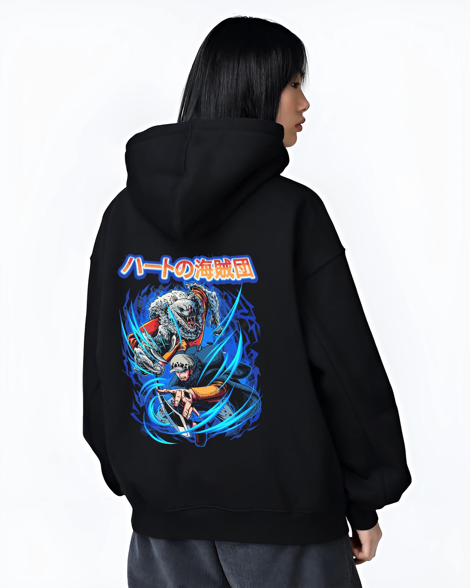 Black hoodie on female model, back view, Trafalgar Law and Bepo retro manga graphic surrounded by vivid blue energy trails and Japanese text.
