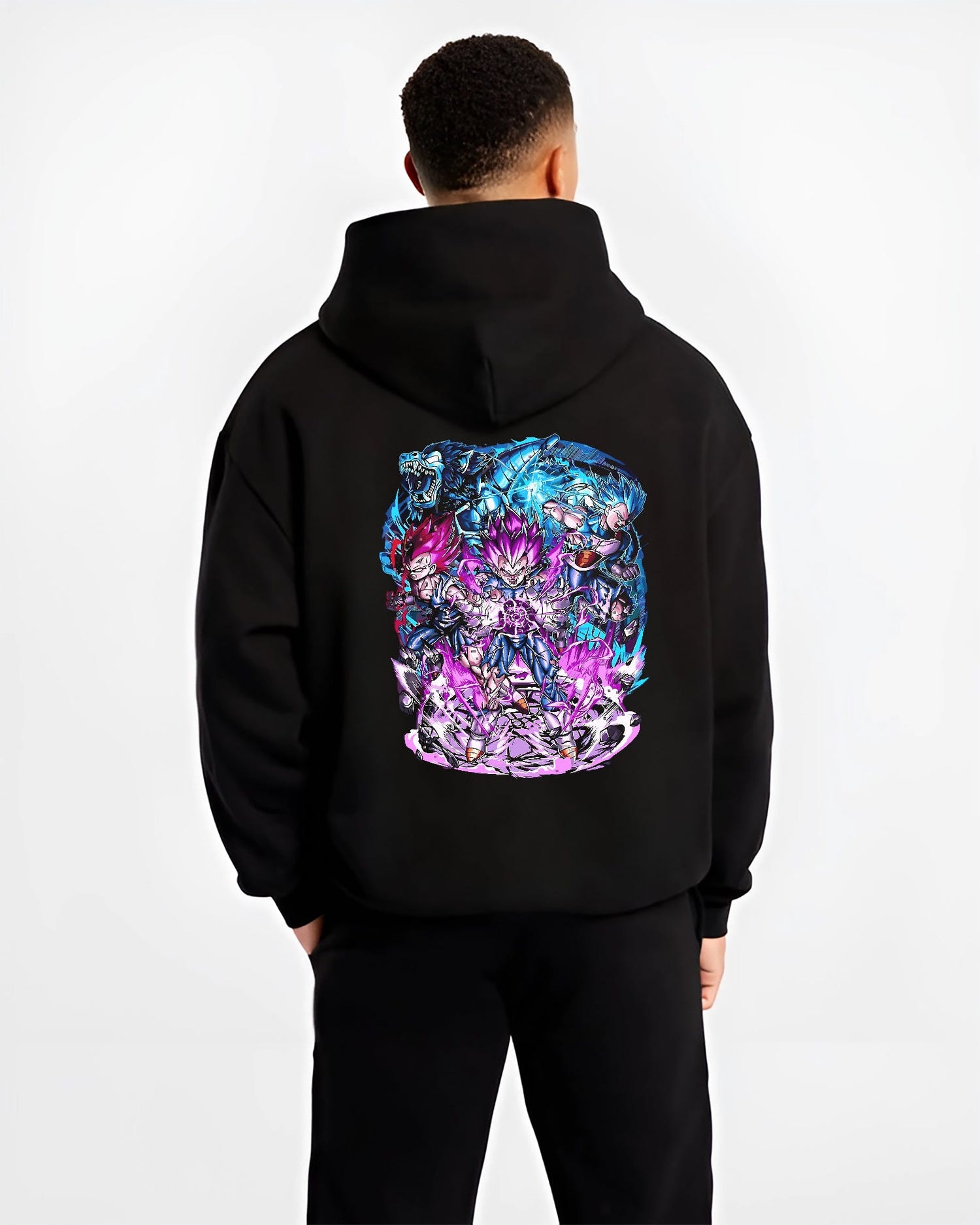 Black hoodie worn by a male model, back view, featuring Vegeta Dragon Ball retro manga graphic with energy-charged stance and Japanese animation streetwear detail.