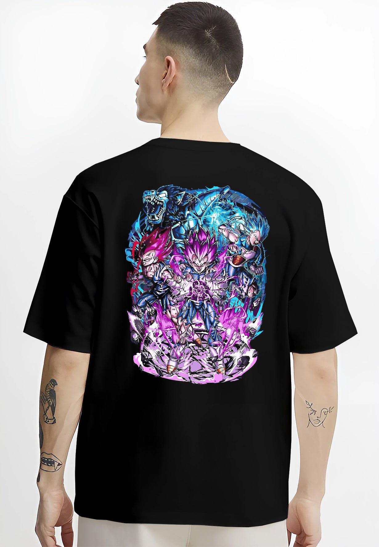Black T-shirt worn by a male model, back view, featuring Vegeta Dragon Ball shonen battle character artwork with powerful purple energy aura and fighting stance.