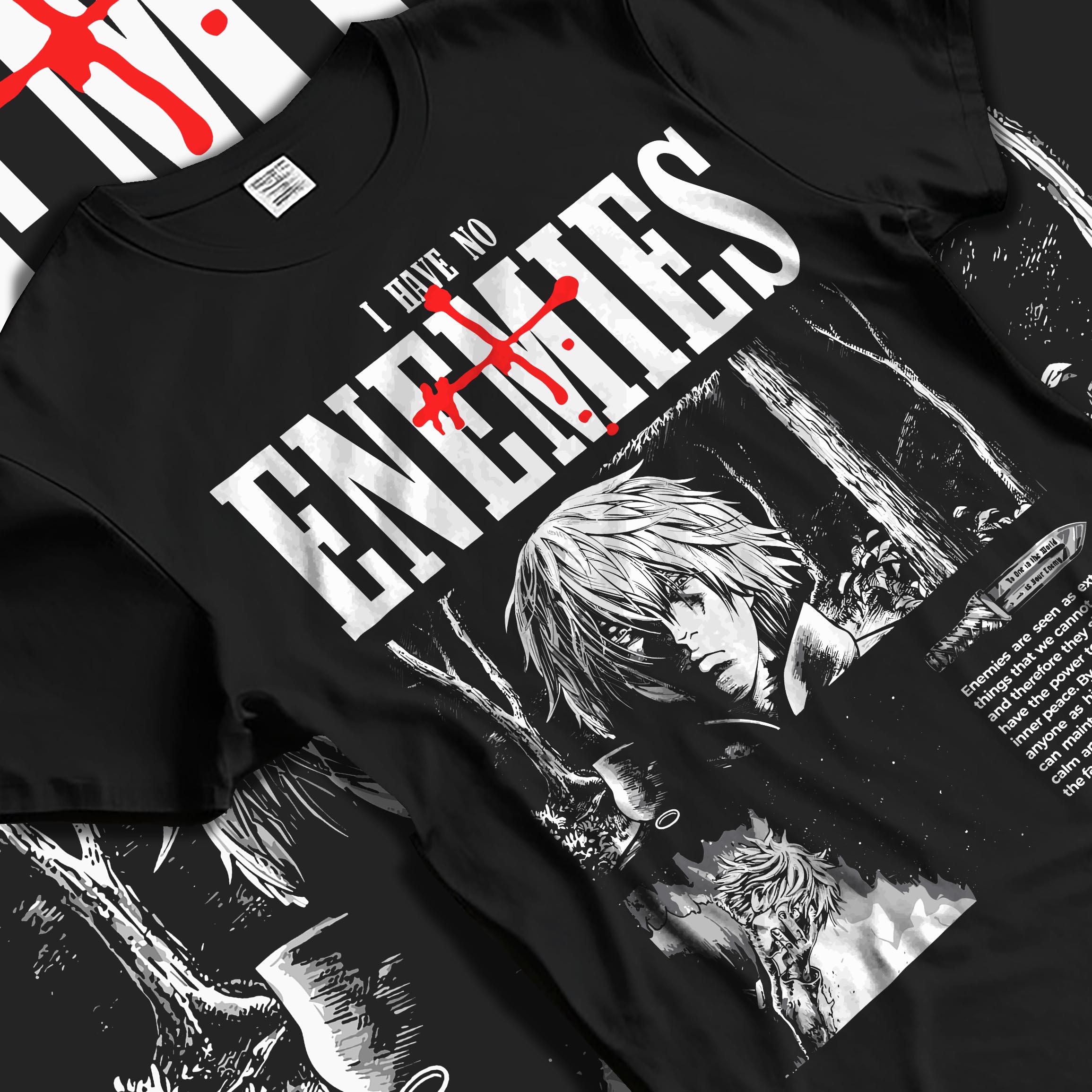 Black T-shirt laid flat with soft folds, featuring Vinland Saga Thorfinn manga panels and bold ENEMIES header.