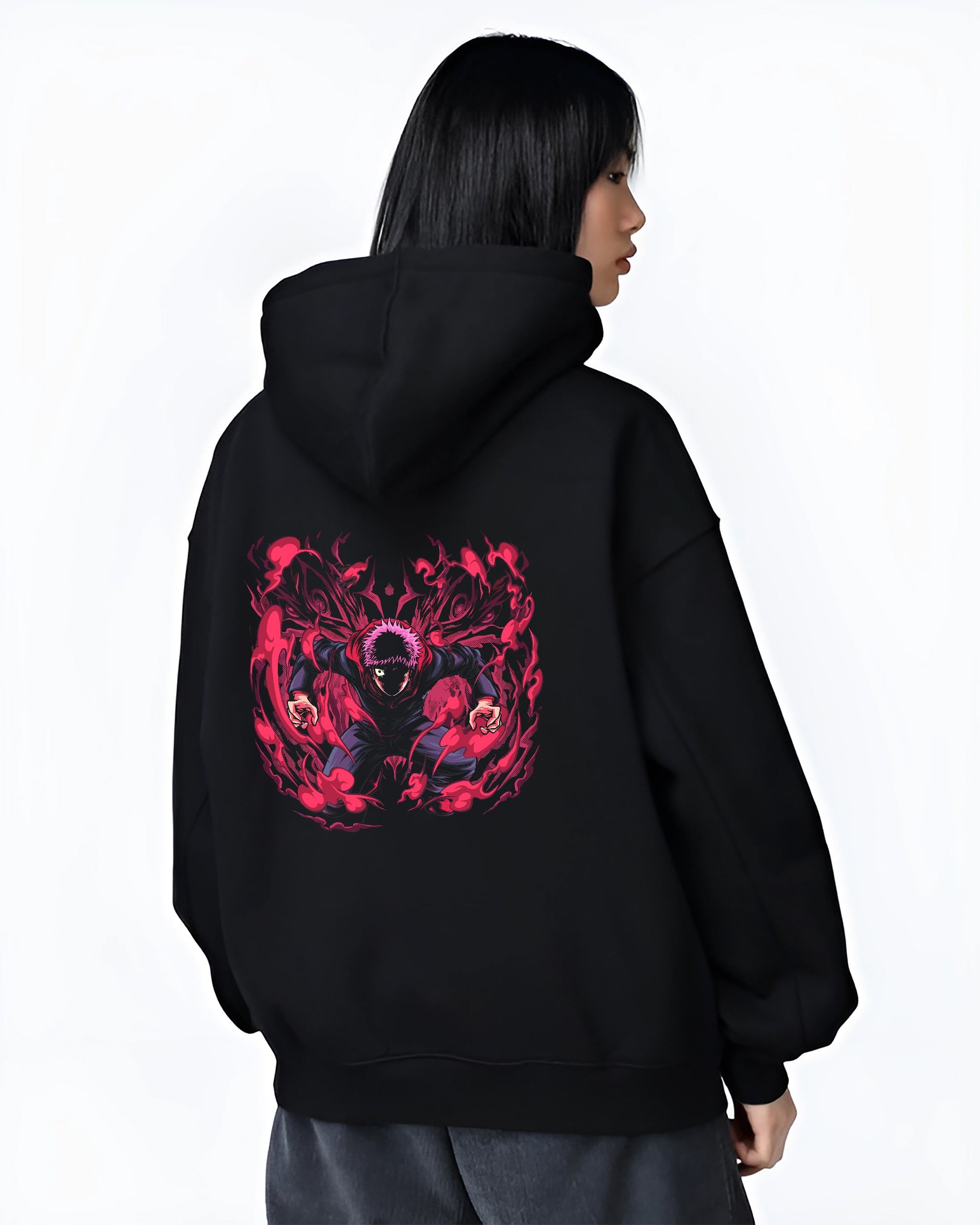 Black hoodie on female model, back view, Yuji Itadori retro manga design with intense red cursed energy framing the character.